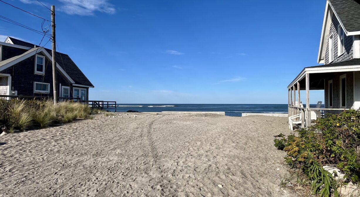 A photograph of an entrance to a beach.