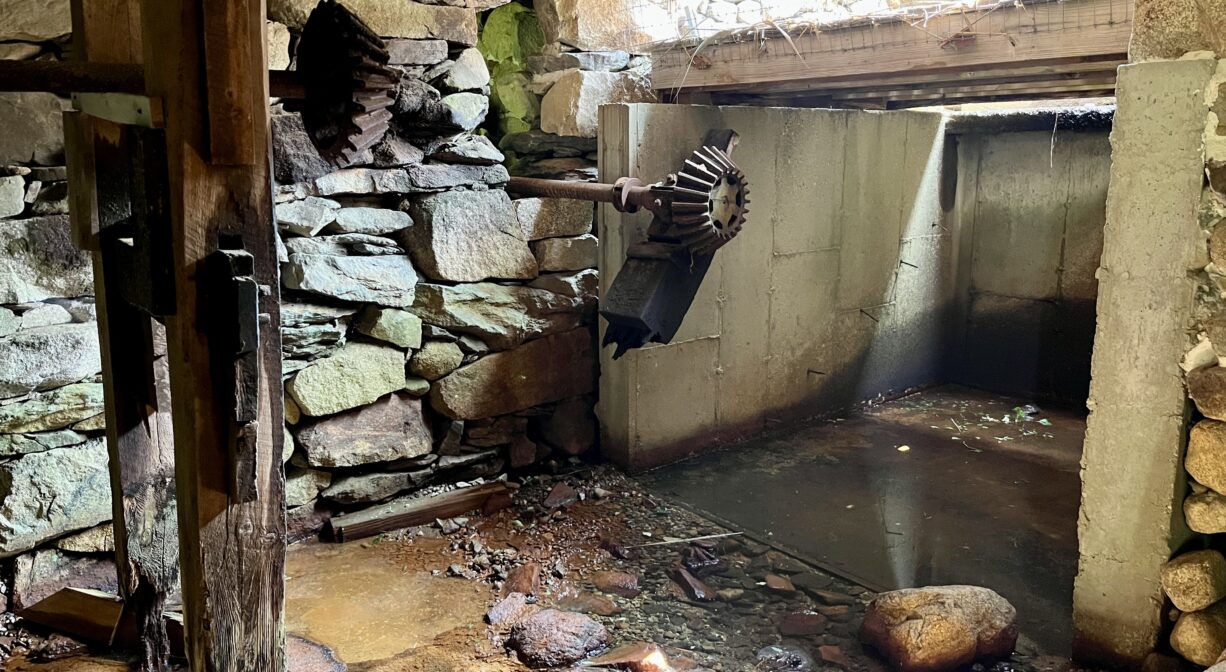 A photograph of the interior of a historic mill.