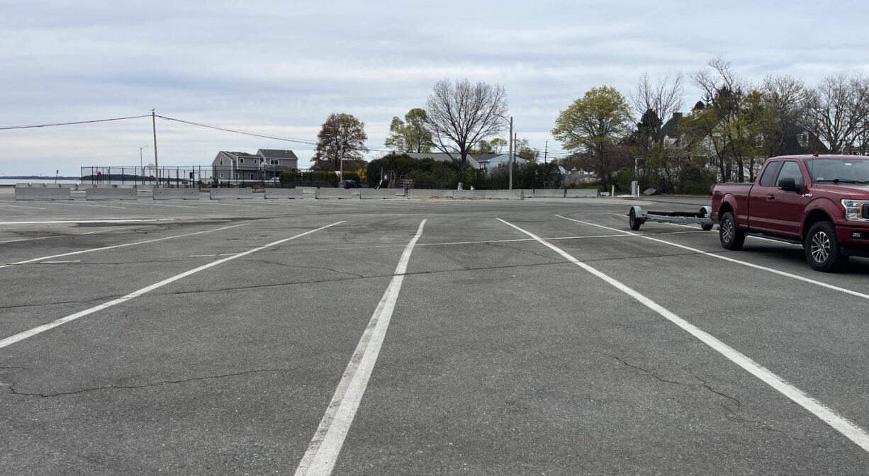 A photograph of a large parking area.