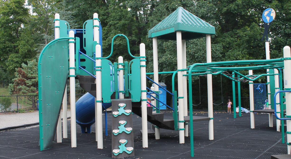 A photograph of a colorful play structure.