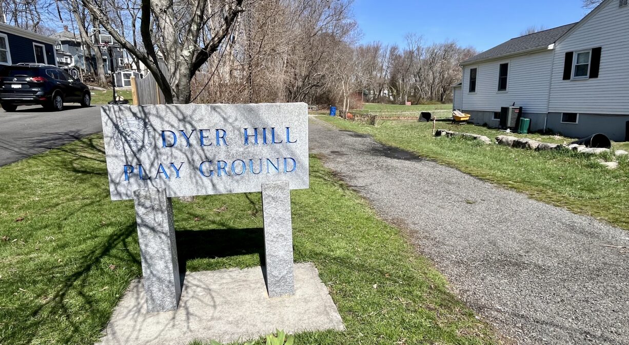 A photograph of a property sign at a park.