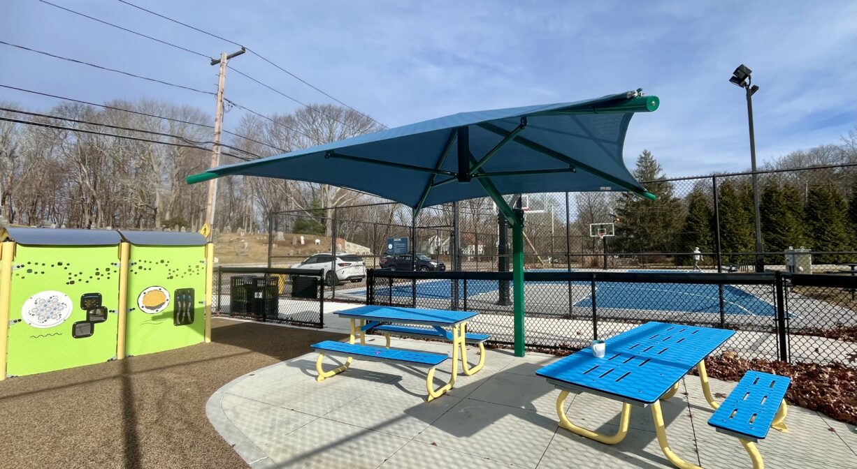A photograph of a picnic area in a playground.